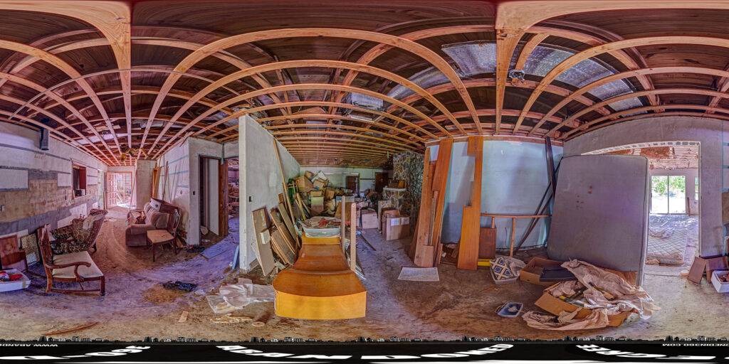 An equirectangular panoramic image inside an abandoned Florida house in the middle of the state. 