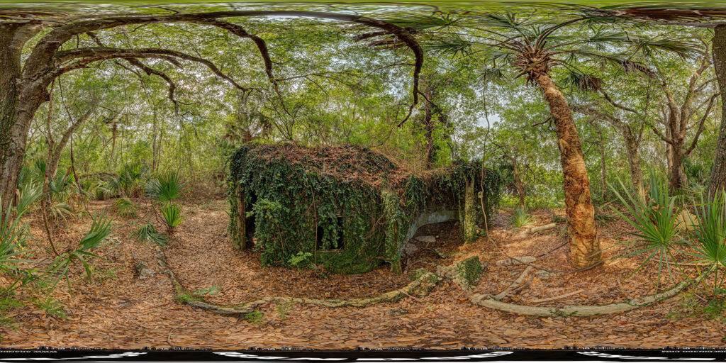 A 360-degree panoramic image captured at some abandoned "Elf Houses" in the woods of a small Florida town.