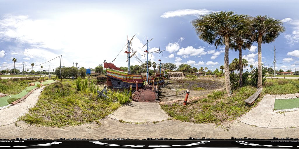 A 360-degree panoramic image in front of the mock pirate shop at the abandoned Pirate's Island Adventure Golf course in Kissimmee, Florida