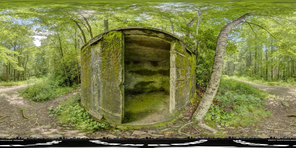 A spherical 360-degree panoramic image of an abandoned dynamite bunker along the roaring fork falls trail in North Carolina.