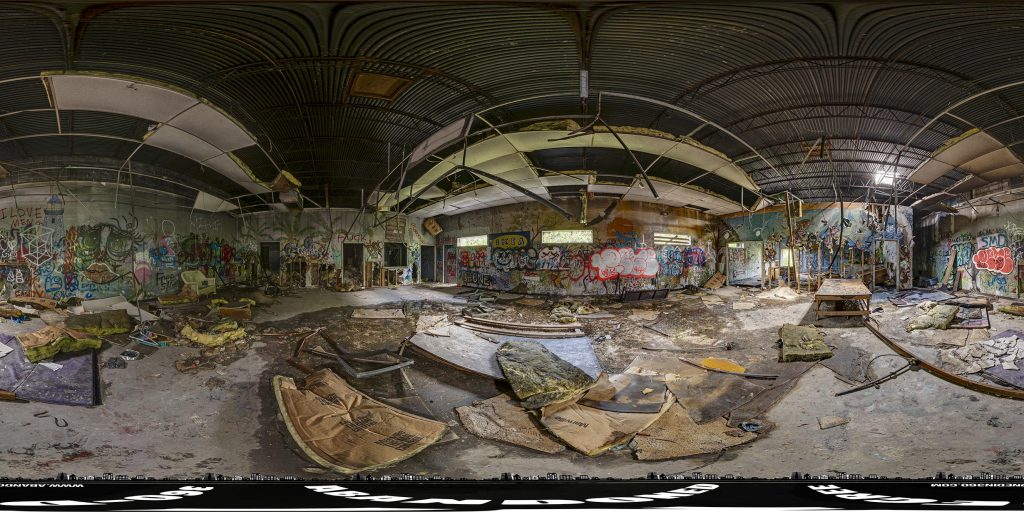 A 360-degree panoramic image inside the gym area of the abandoned Summit Charter School in Central Florida. 