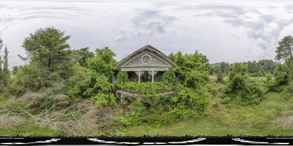 A 360-degree panoramic image in front of the iconic Jeff White House in North Carolina.
