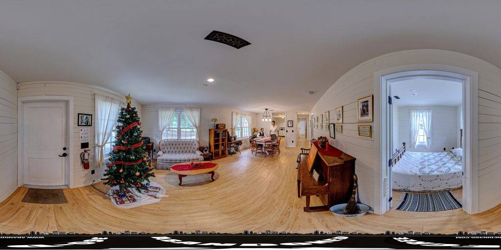 A 360-degree spherical panoramic image captured inside the Harry T. Moore and Harriette Moore Home. 
