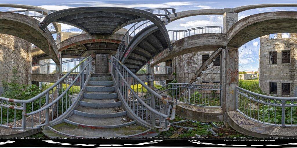 A 360-degree panoramic image captured in the main stairwell of the Crane View Condos in Merritt Island, Florida. 