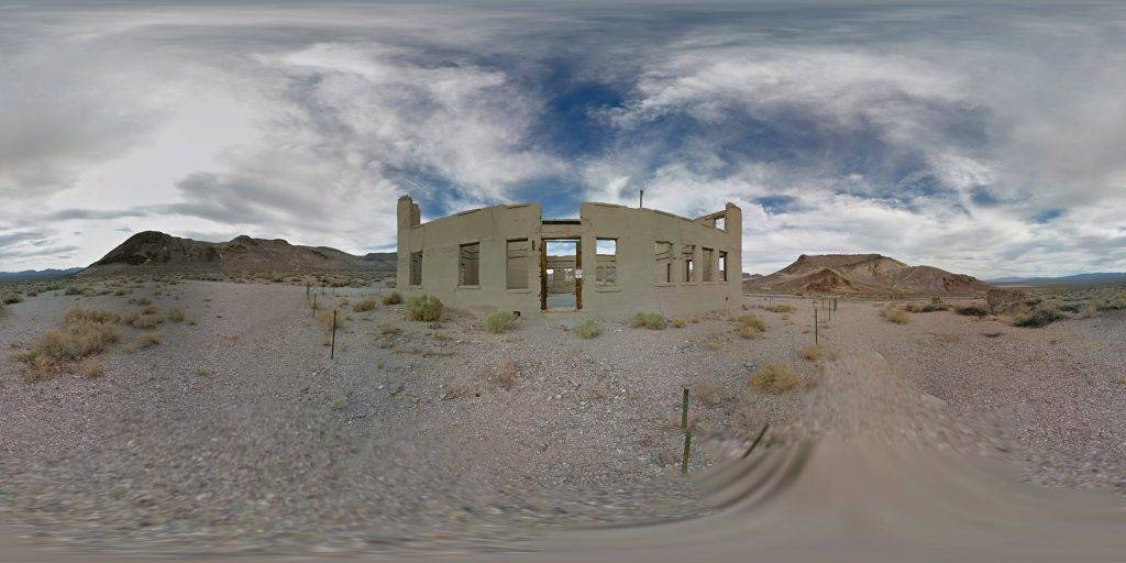 A equirectangular panoramic view of the abandoned Rhyolite School House in the Rhyolite Ghost Town in Nevada. Image by Google Maps Street View 9-2015