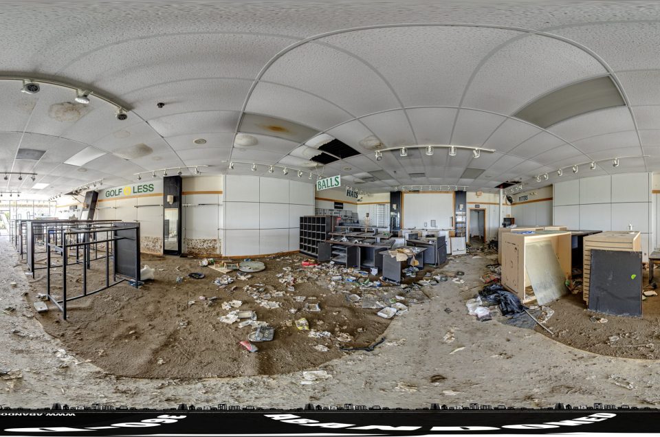 A 360-degree panoramic image captured inside the abandoned Golf 4 Less outlet store in Florida.