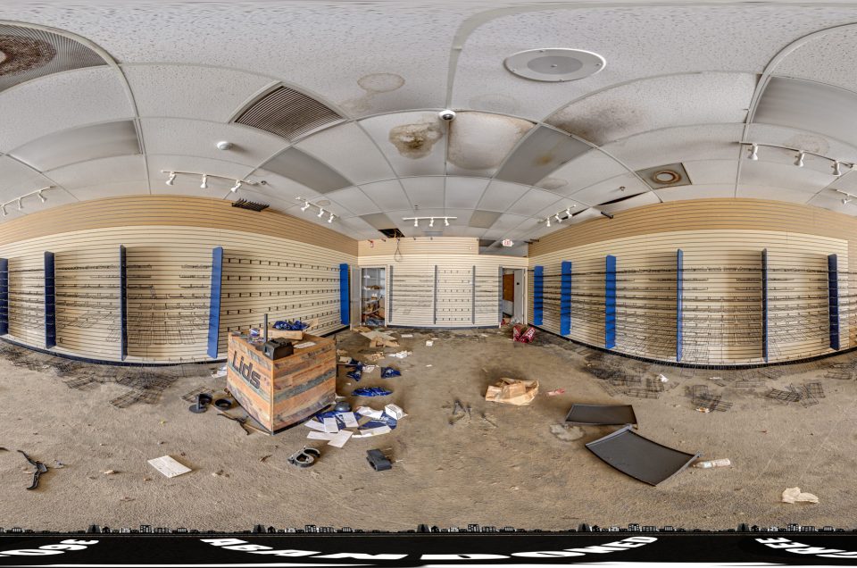 A 360-degree panoramic image captured inside the abandoned Lids Outlet Store in Iona, Florida. Image by the Abandonedin360.com Team