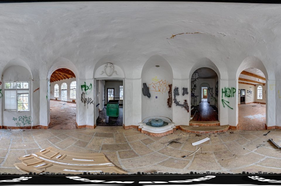 A 360-degree panoramic image showing the foyer of the abandoned Bin Laden Mansion aka the Desert Bear Mansion in Central Florida.