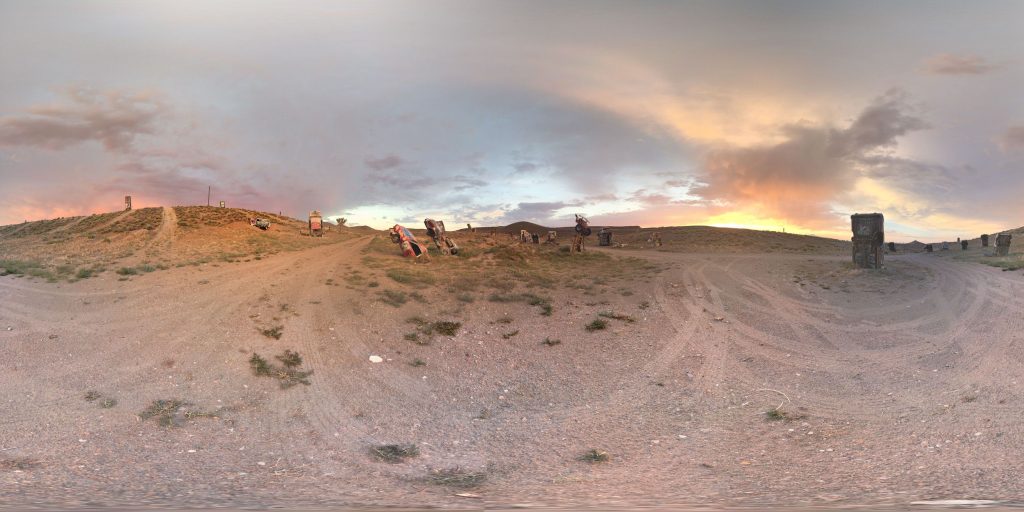 A 360-degree panoramic image captured at sunset at the International Car Forest in the Nevada Desert. Image by: Joan Pan