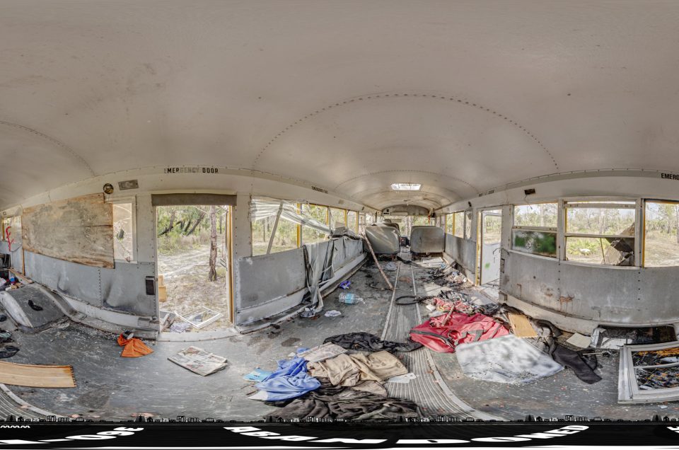 A 360-degree panoramic image showing an abandoned bus in the Florida woods. Image by: Abandonedin360.com