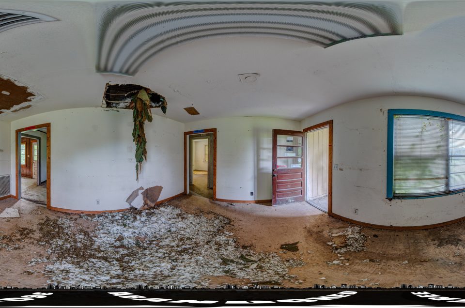 A 360-degree panoramic image captured inside the abandoned Dunnellon Ranger Station in Central Florida. Photograph by the Abandoned in 360 Urbex Team