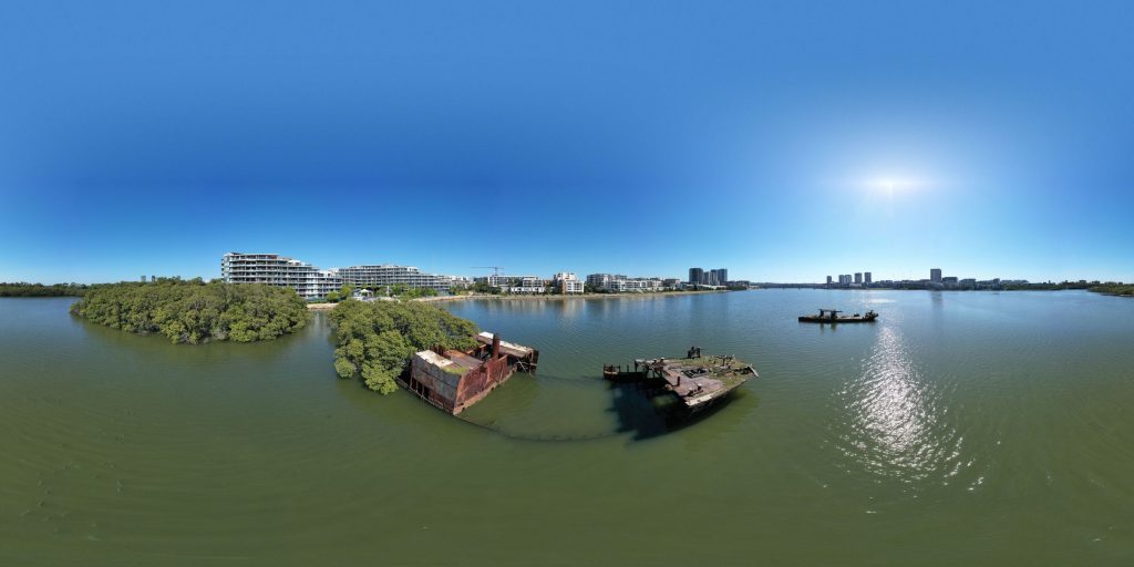 An aerial 360-degree panoramic image capturing the rusting remains of the SS Ayrfield at Wentworth Point in New South Wales, Australia. Photo by: Grae McDowell