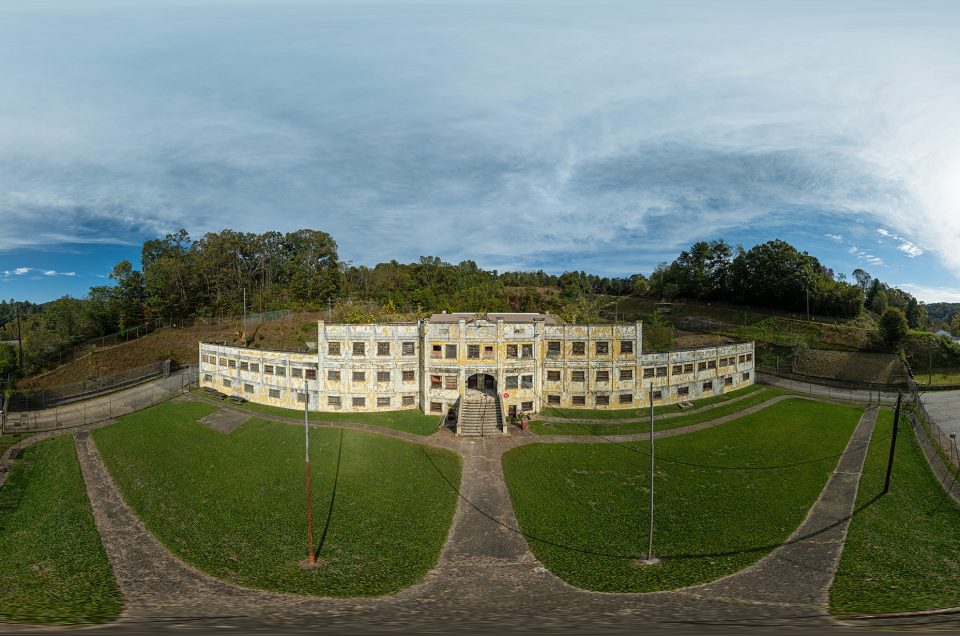 An aerial 360-degree panoramic image of the exterior of the Old Craggy State Prison in Asheville, North Carolina.