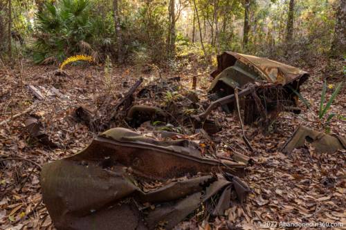Abandoned vehicle along the Herky Huffman / Bull Creek Trail in St. Cloud, Florida.