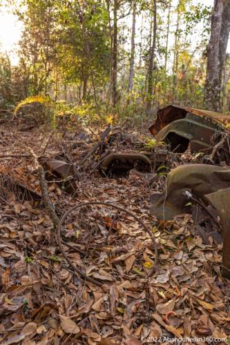 Abandoned vehicle along the Herky Huffman / Bull Creek Trail in St. Cloud, Florida.