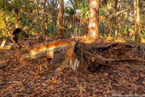 Abandoned vehicle along the Herky Huffman / Bull Creek Trail in St. Cloud, Florida.