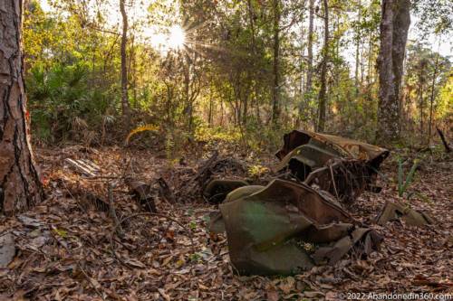 Abandoned vehicle along the Herky Huffman / Bull Creek Trail in St. Cloud, Florida.